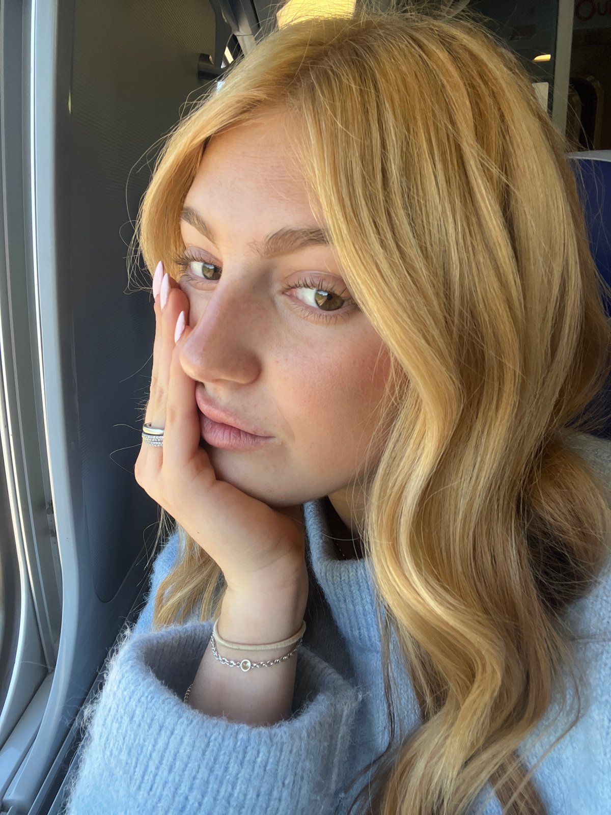 Woman takes casual selfie in Sarry, France