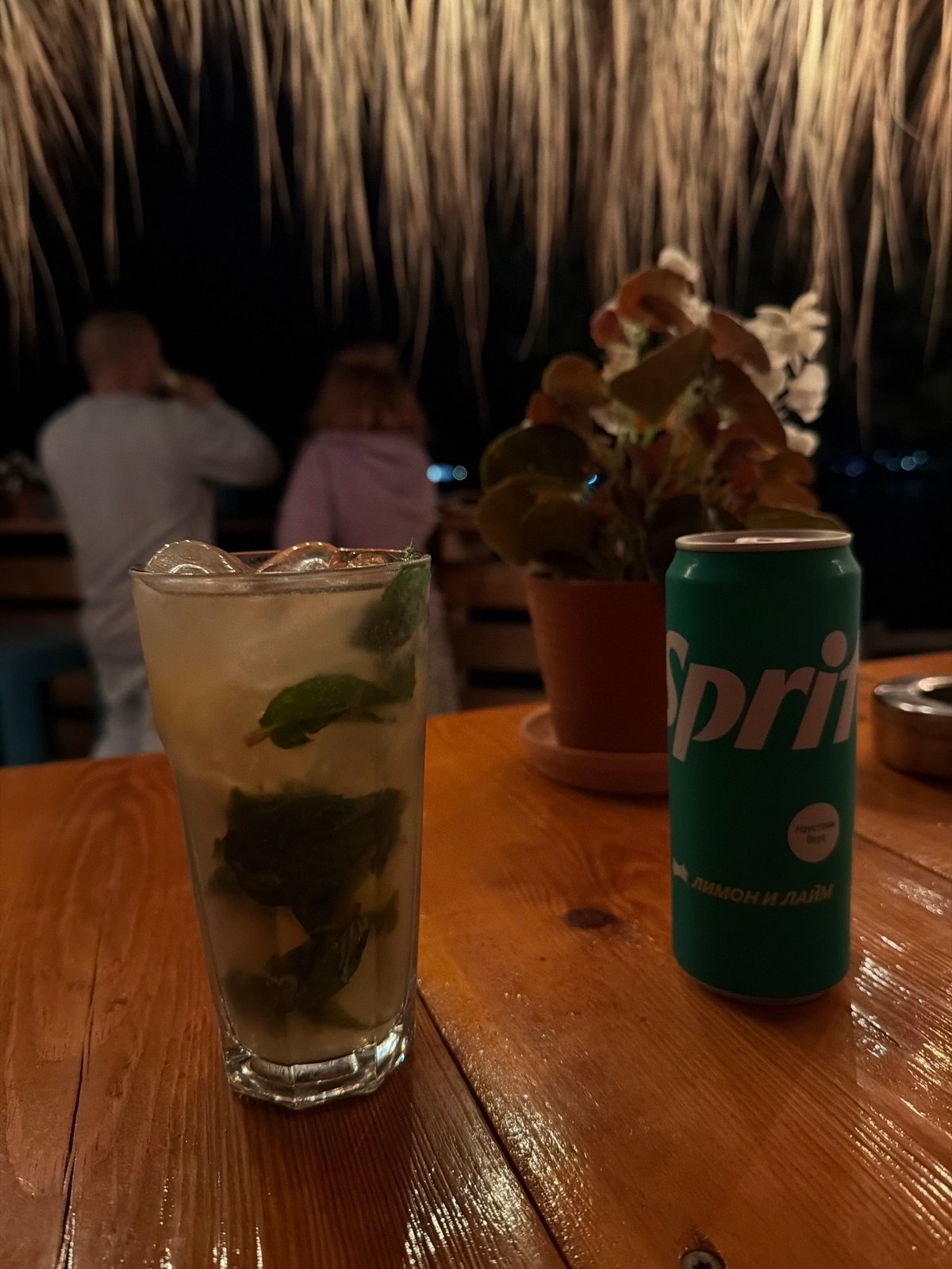 Men socialize at Tsarevo bar during evening hours