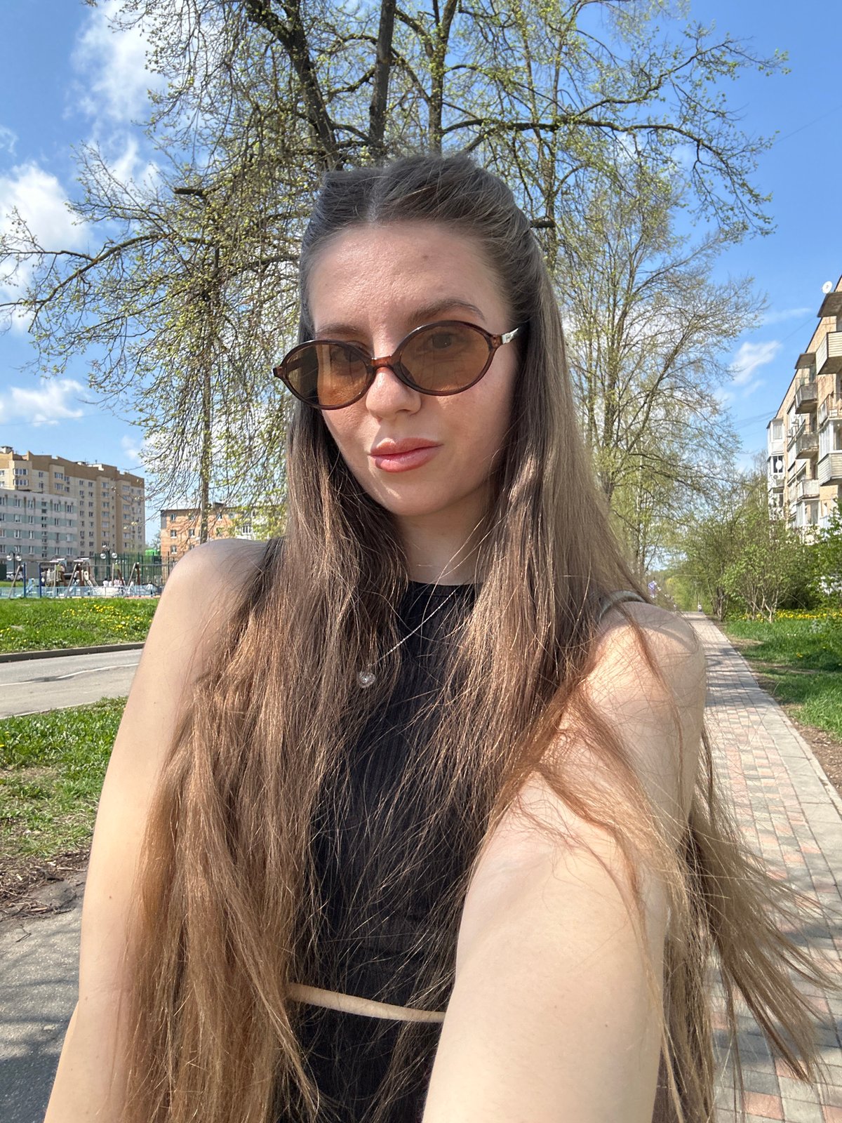 Woman photographed during selfie session in Klin, Russia