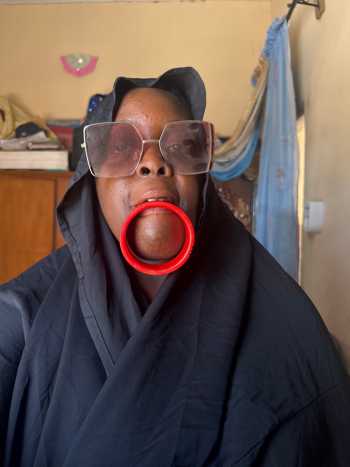 Woman in traditional dress photographed in Madangala, Nigeria