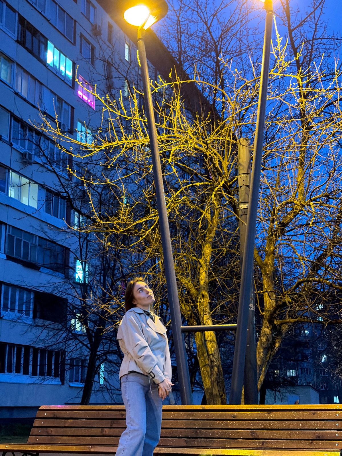 Evening street life documented in Izhevsk during dusk hours