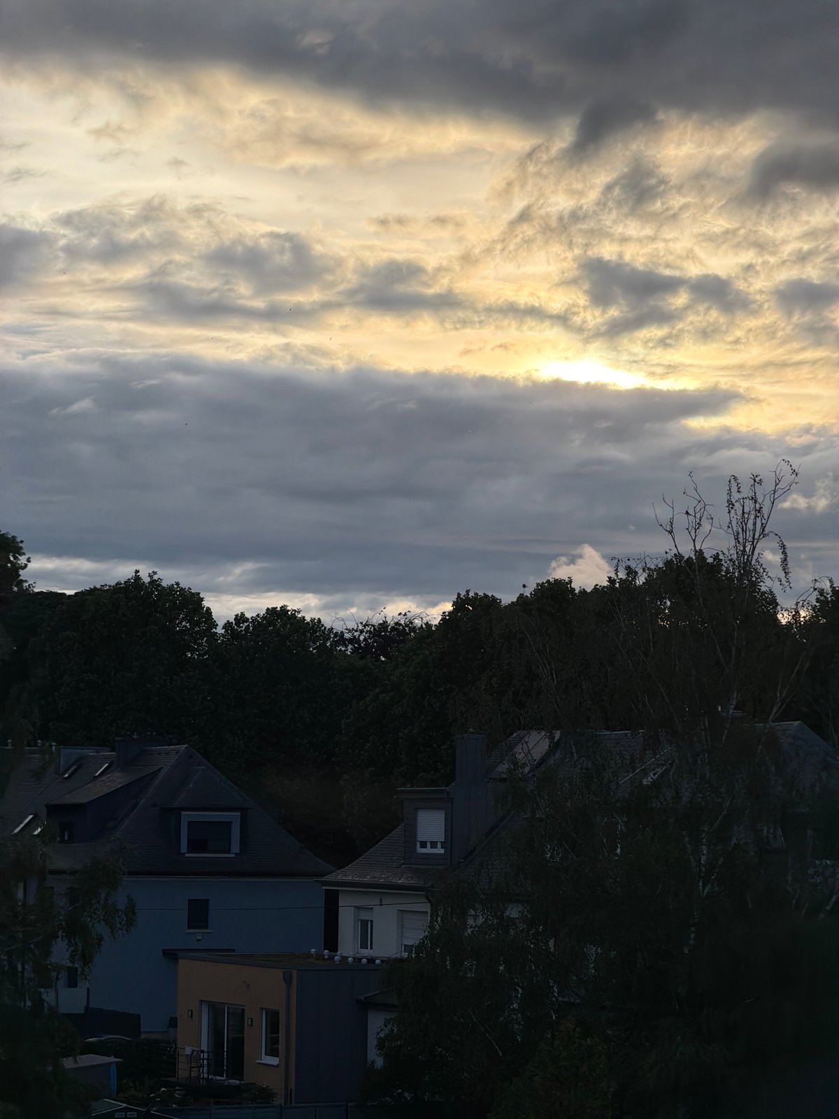 Dramatic sky conditions documented over Luxembourg residential area