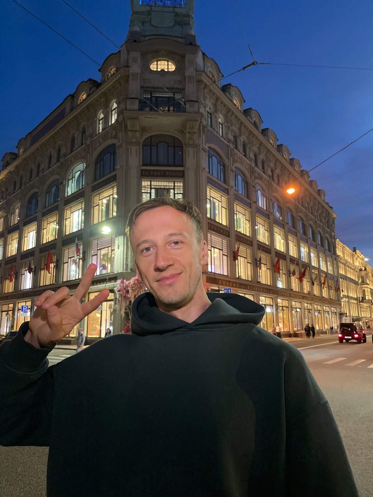 Couple documents evening stroll through Saint Petersburg canals and streets