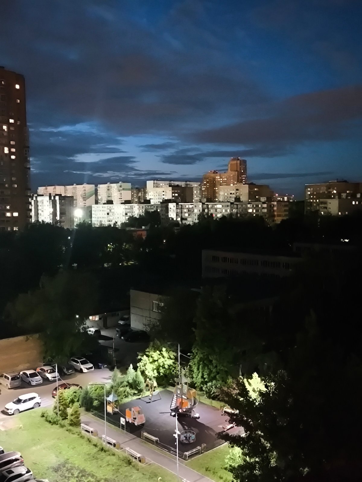 Urban sunset to nighttime transition documented by single witness
