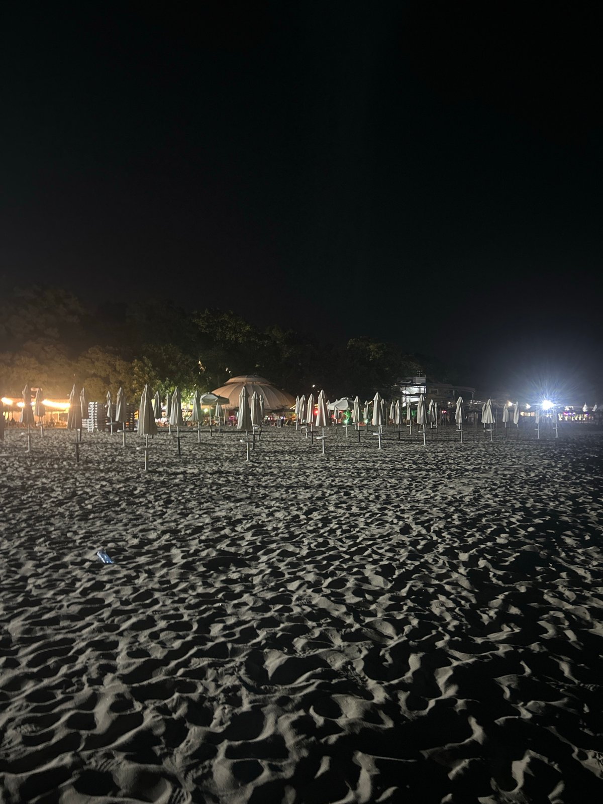 Varna's beach strip winds down on a summer night