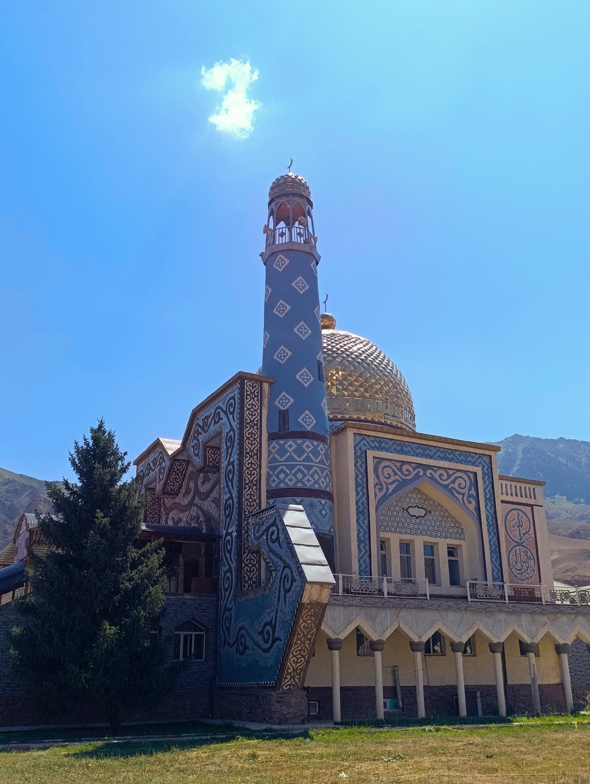 Inside and outside a decorated mosque in Naryn City
