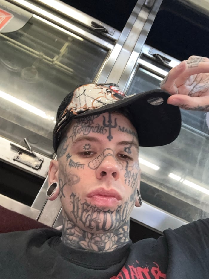 Tattooed person photographed in Buenos Aires
