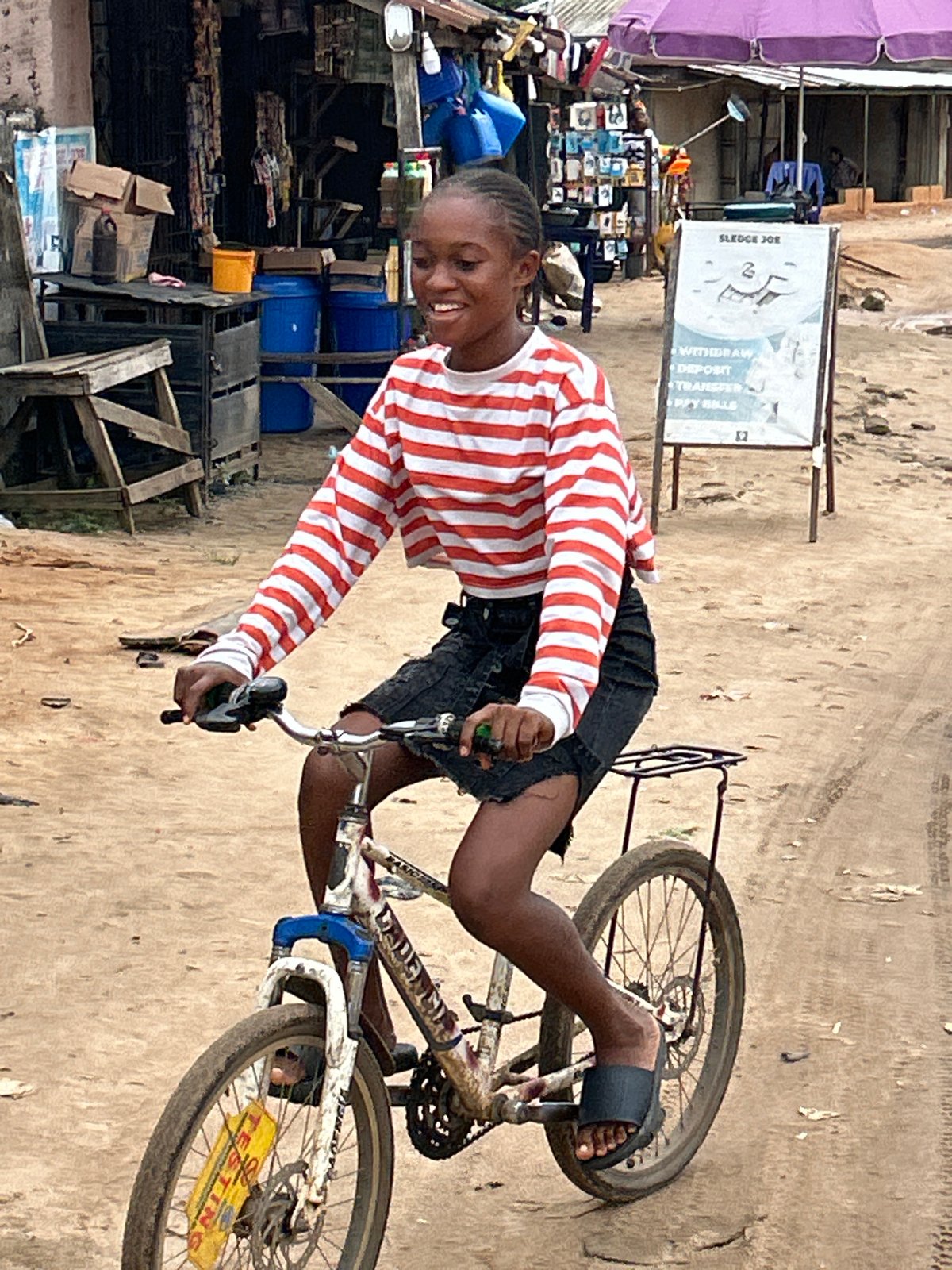 Daily street life along Ihiagwa's dusty roads