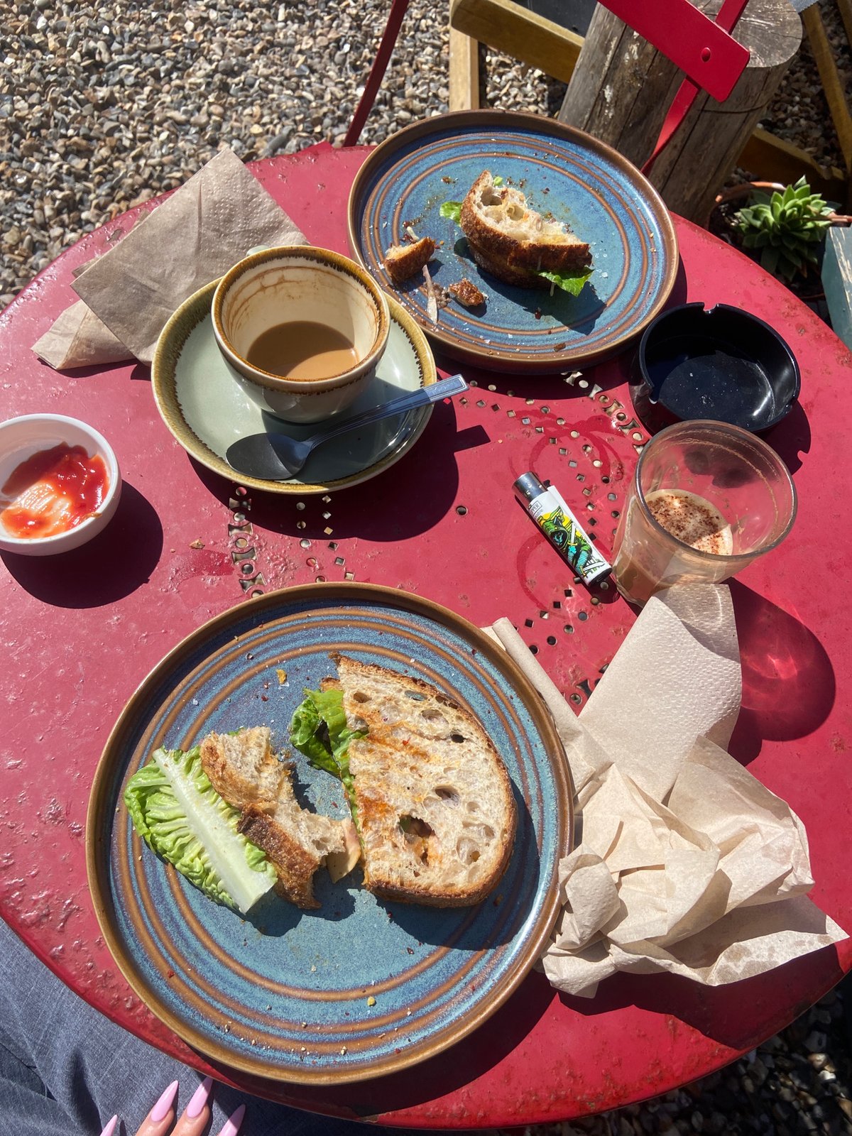 Woman enjoys outdoor café meal in London