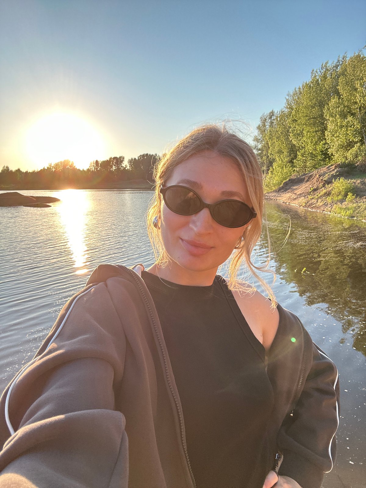 Golden hour in Chaikovsky — riverside selfies, playgrounds, and sunset skies