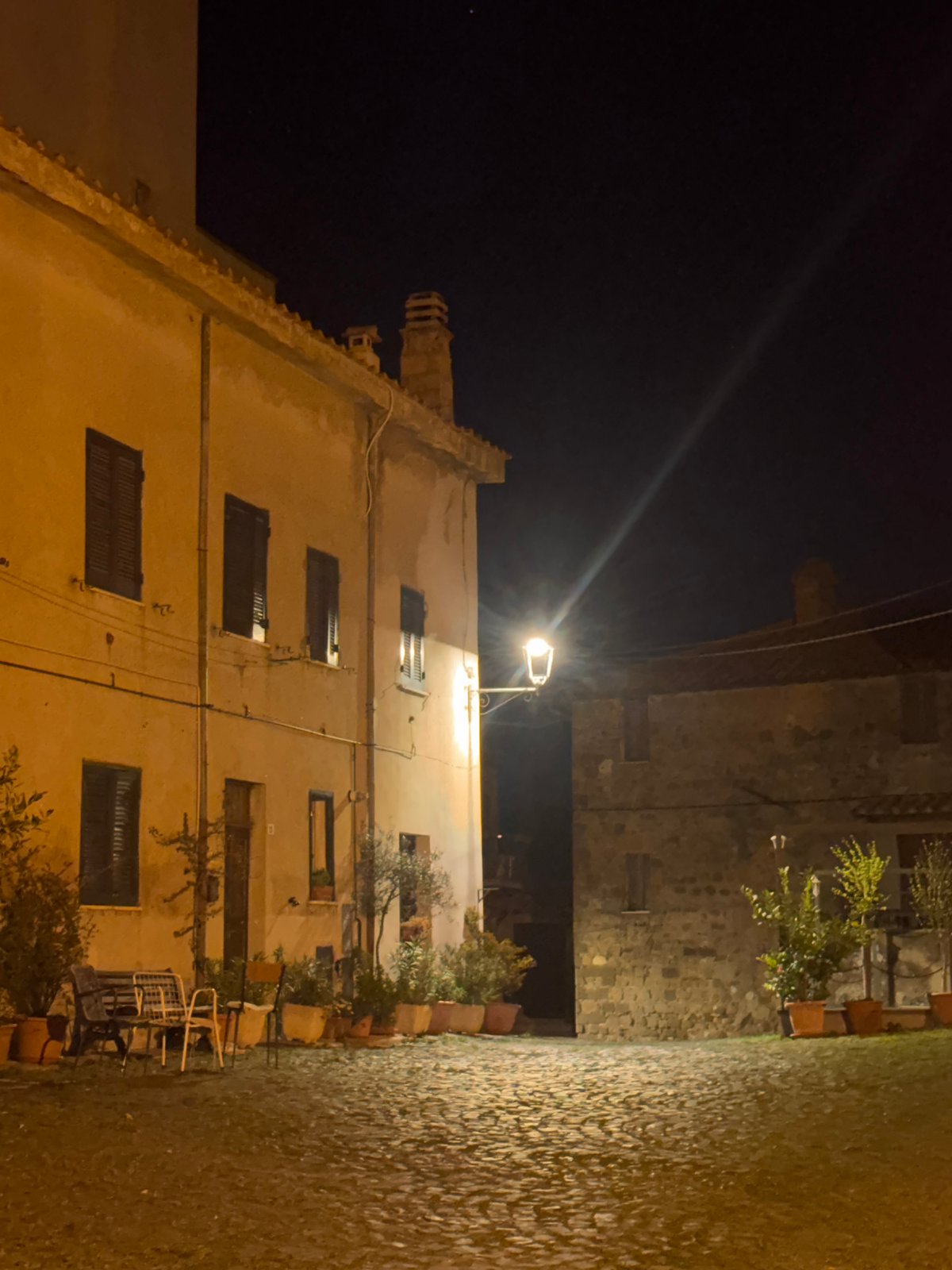 Evening stroll documented through historic Italian town streets