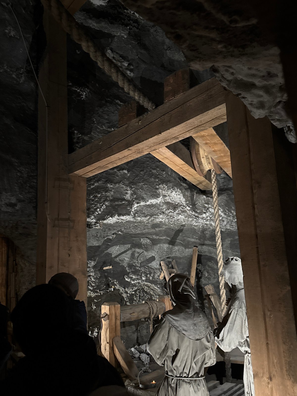 Tourists explore historic Wieliczka Salt Mine underground chambers