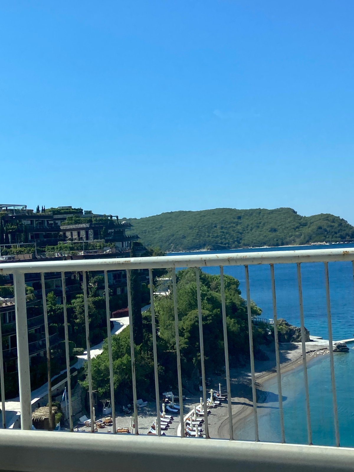 Panoramic coastal view captured from balcony in Budva, Montenegro