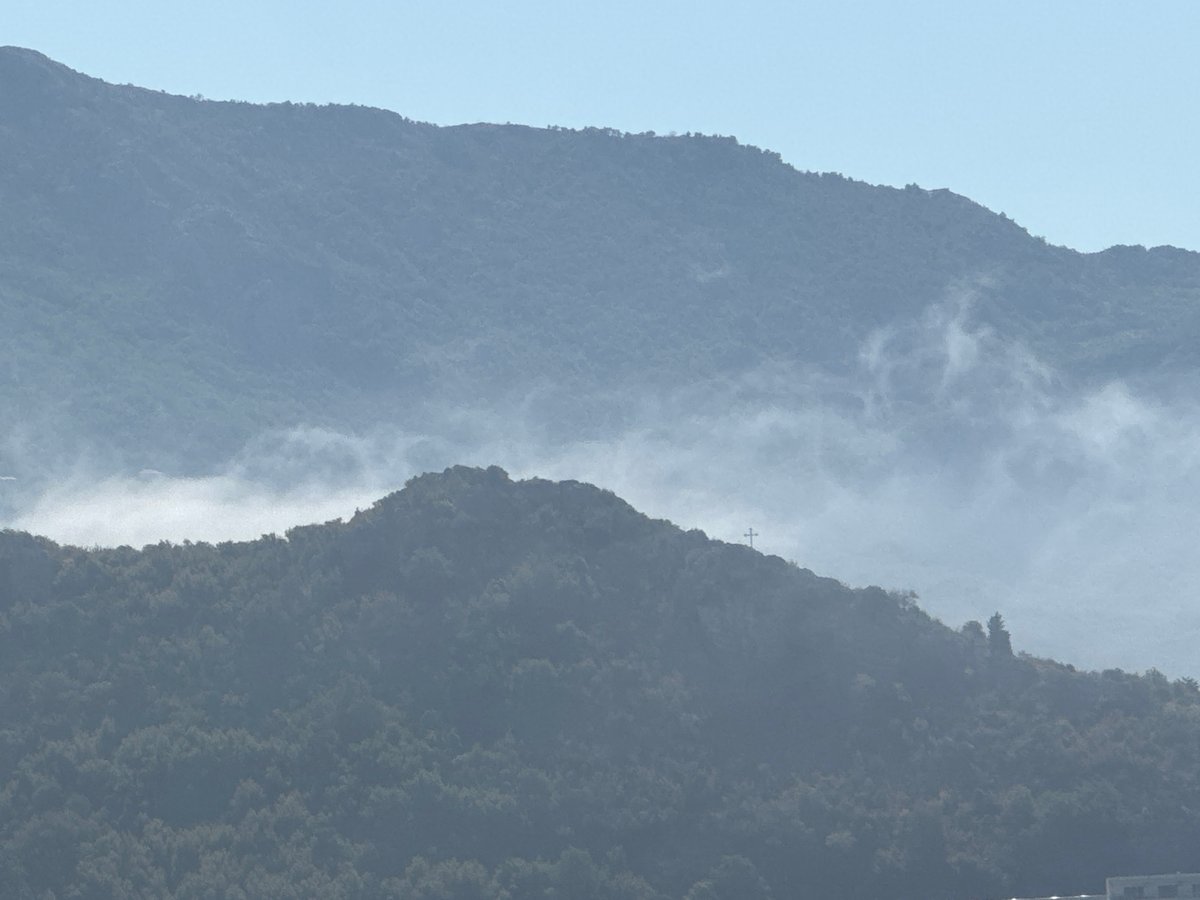 Beach, ruins, and mountain mist in coastal Montenegro