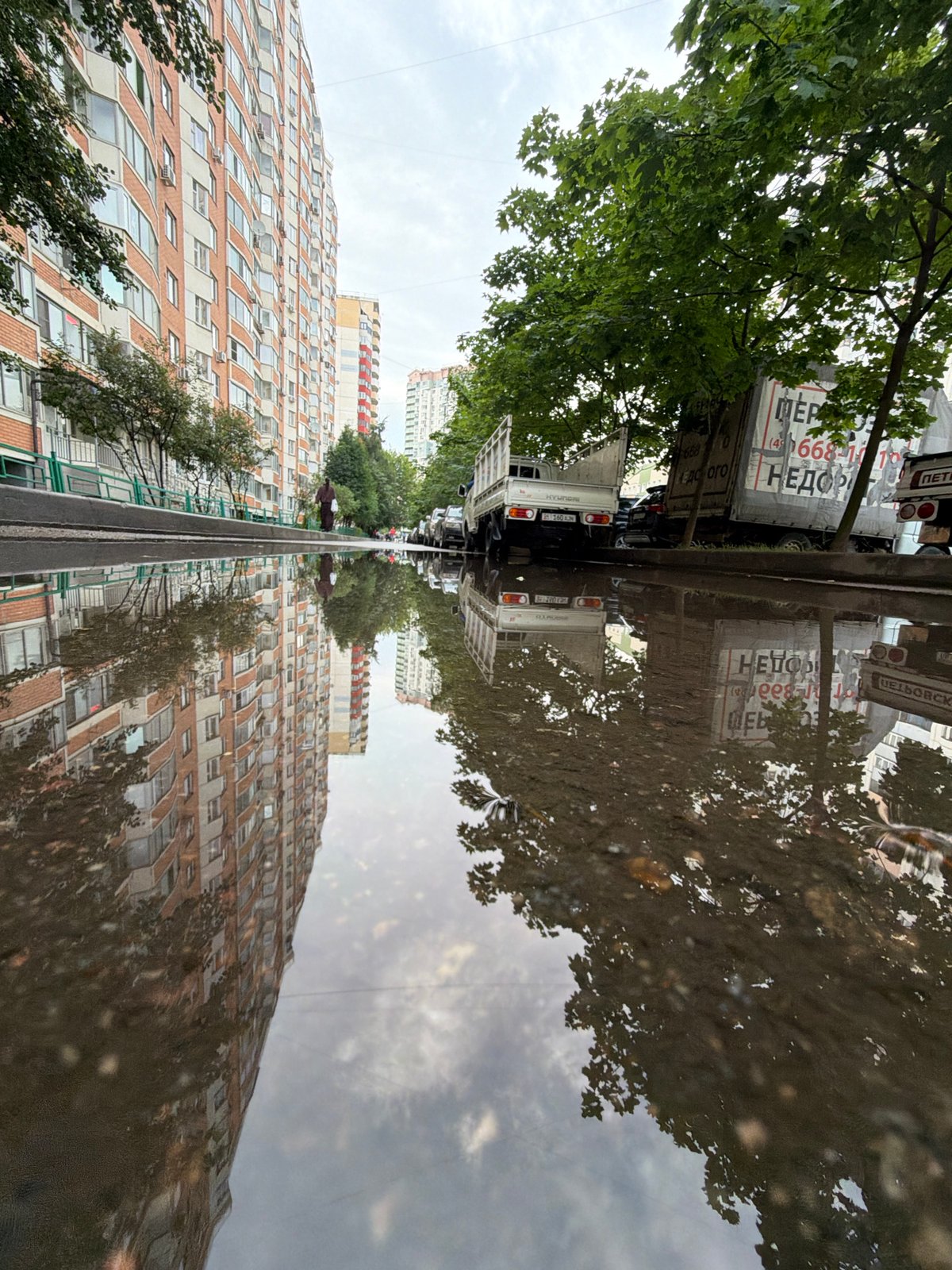 Khimki streets and buildings after a summer rain