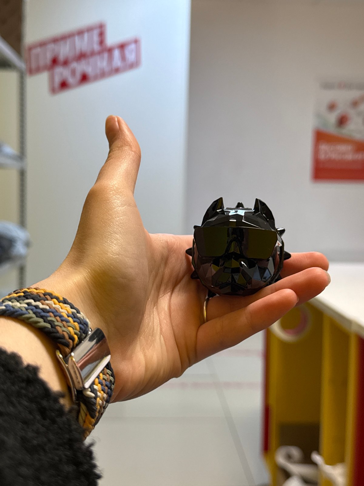 Person documents unboxing black spiked car accessory over 77 minutes
