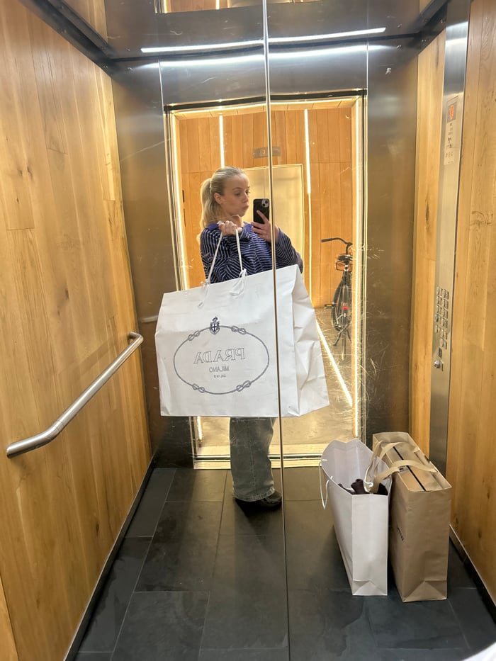 Woman spotted in London commercial building elevator and corridor