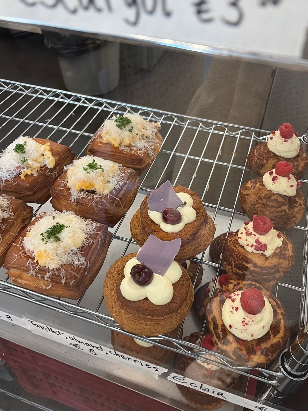 Sofia bakery displays pastries with white cream toppings