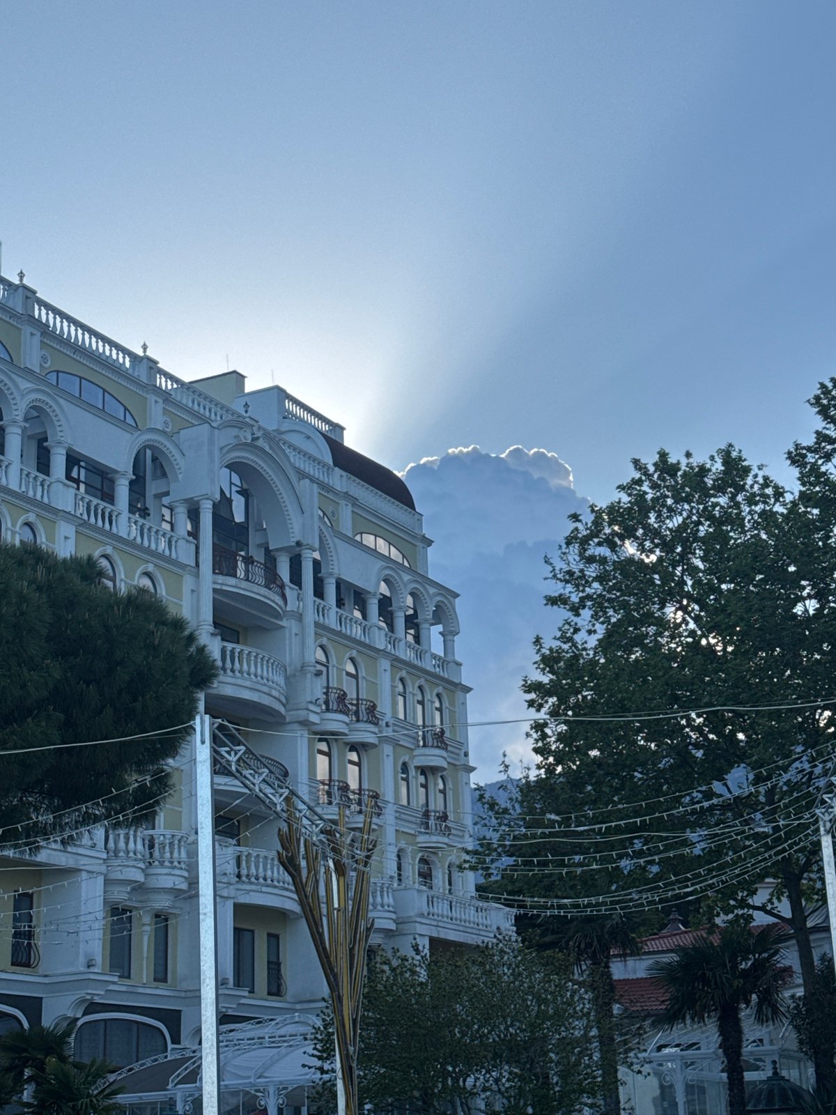 Tourist activities documented along Yalta waterfront during sunny afternoon