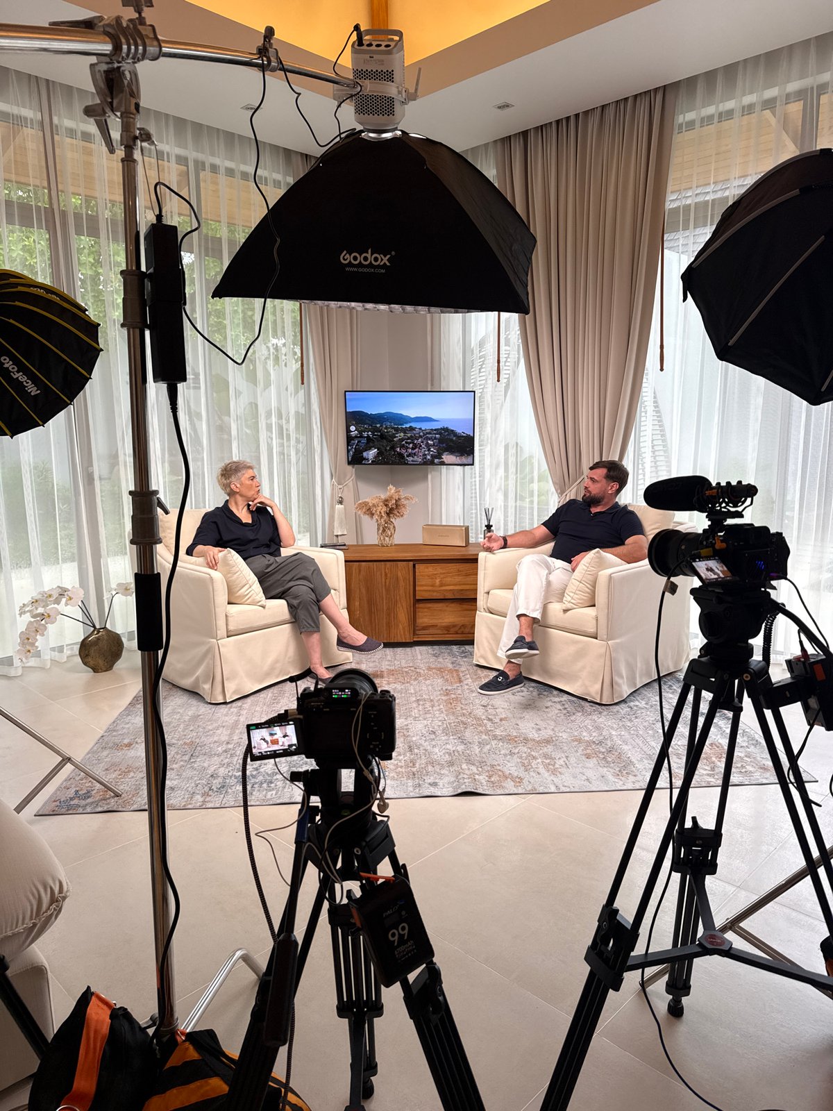 Sit-down interview filmed indoors in Thep Krasatti, Thailand