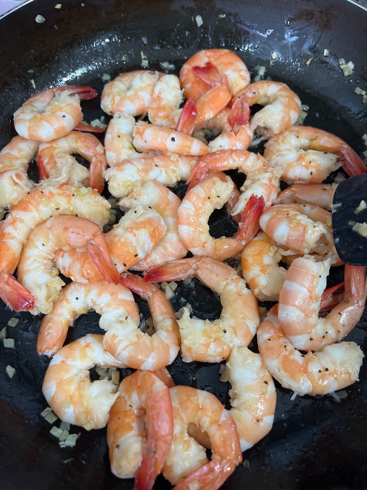 Seasoned shrimp cooked in pan in Mexico neighborhood
