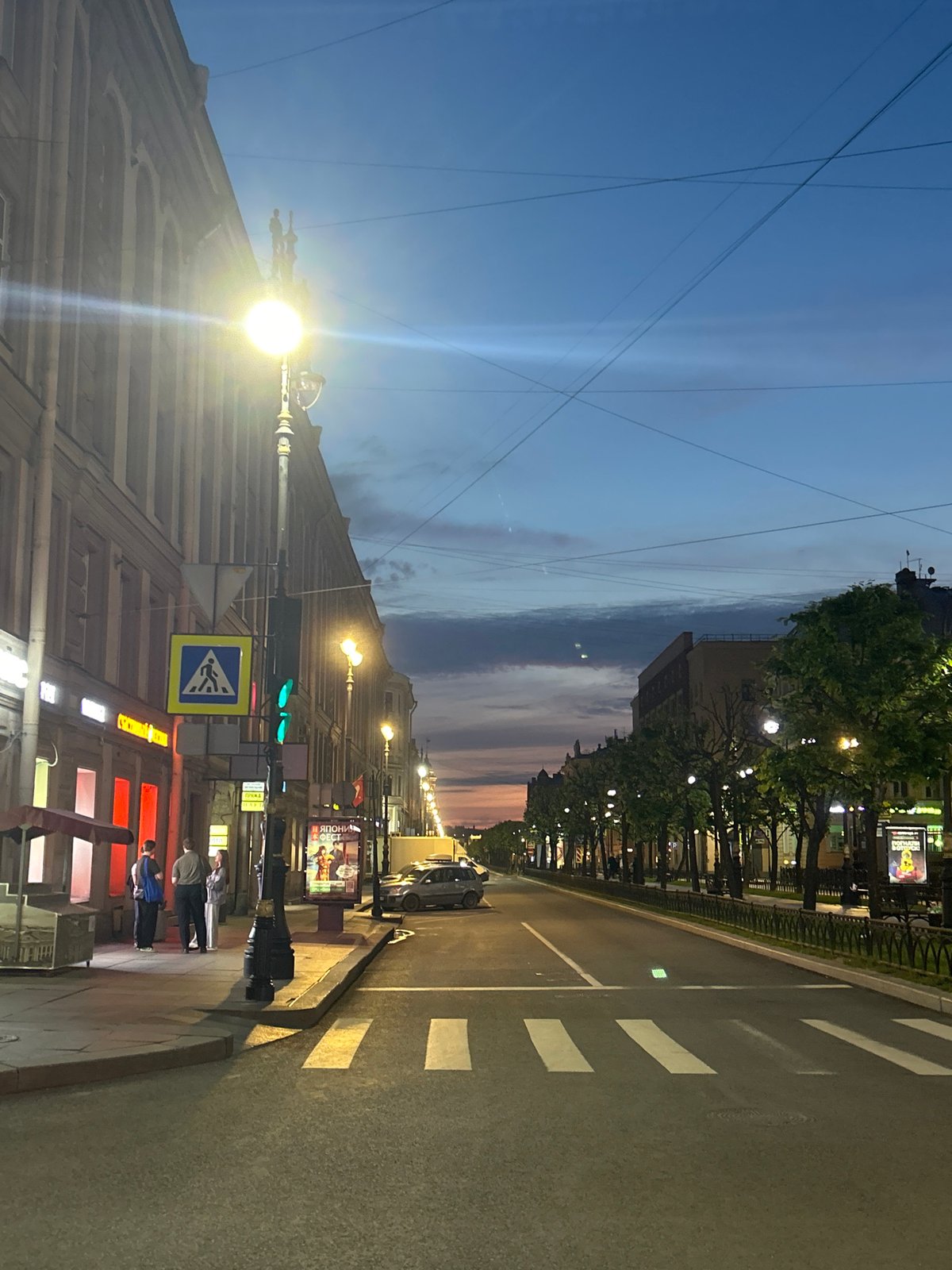 Twilight street scene with ornate architecture captured by witness