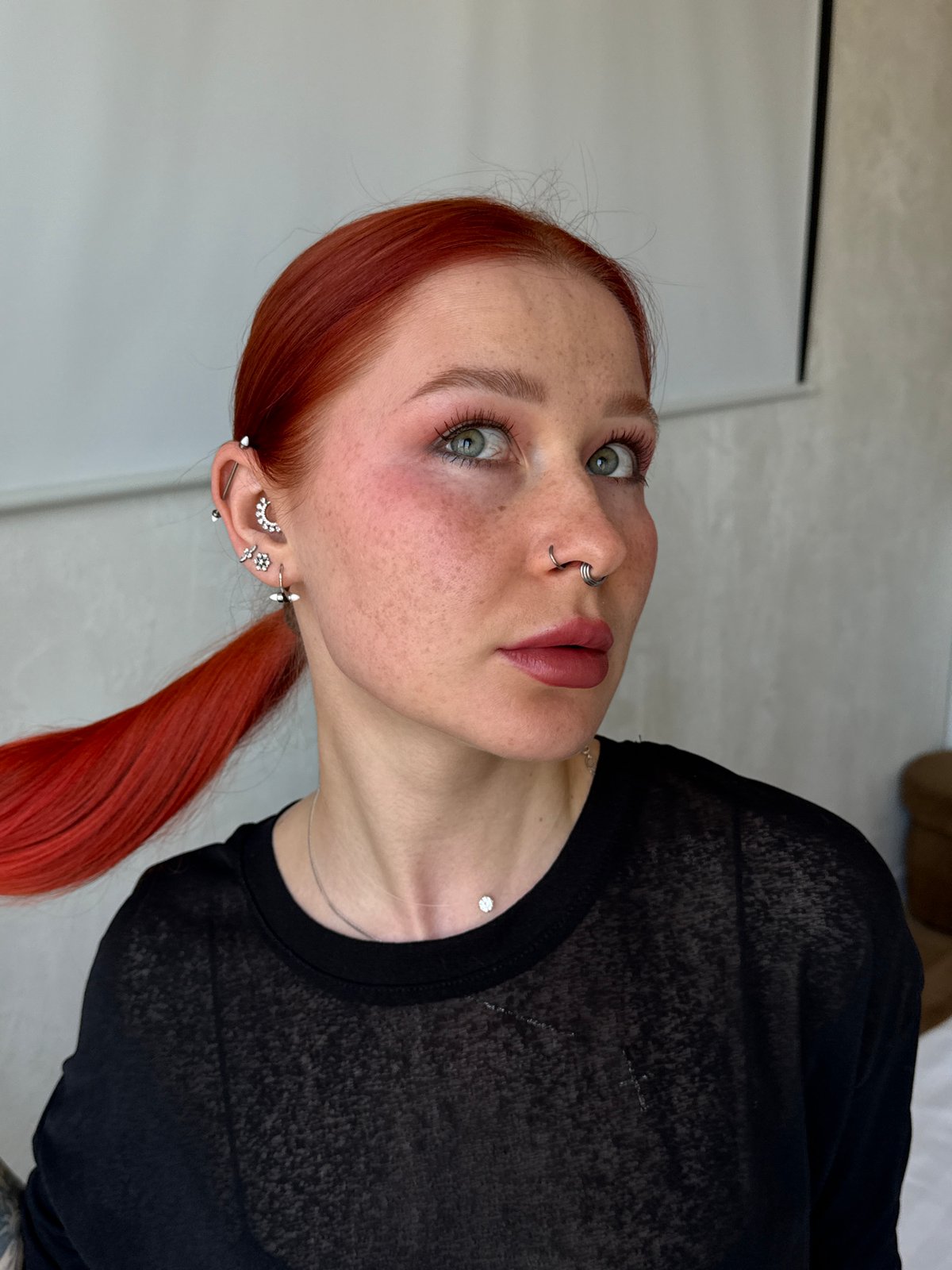 Red-haired woman photographed taking selfies in Rostov-on-Don