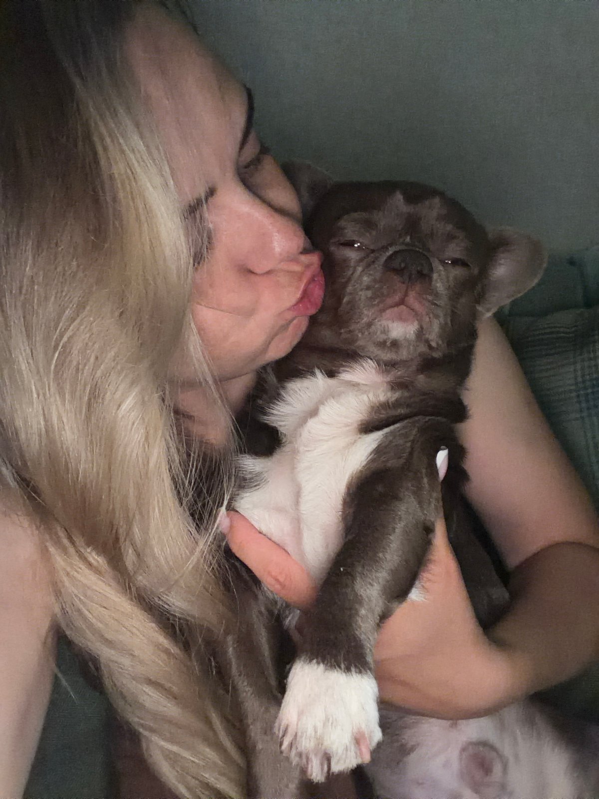 Woman photographed with puppy in multiple poses in Votkinsk