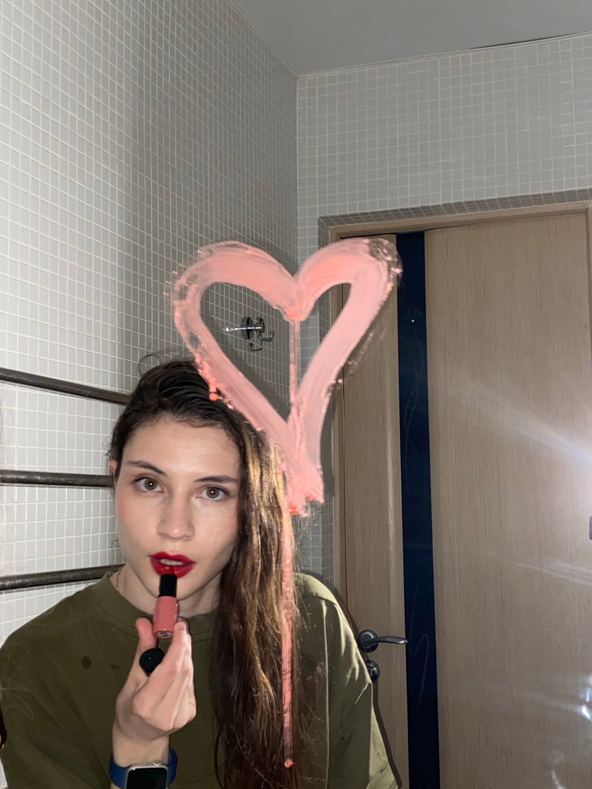 Woman Takes Multiple Mirror Selfies in Votkinsk Bathroom