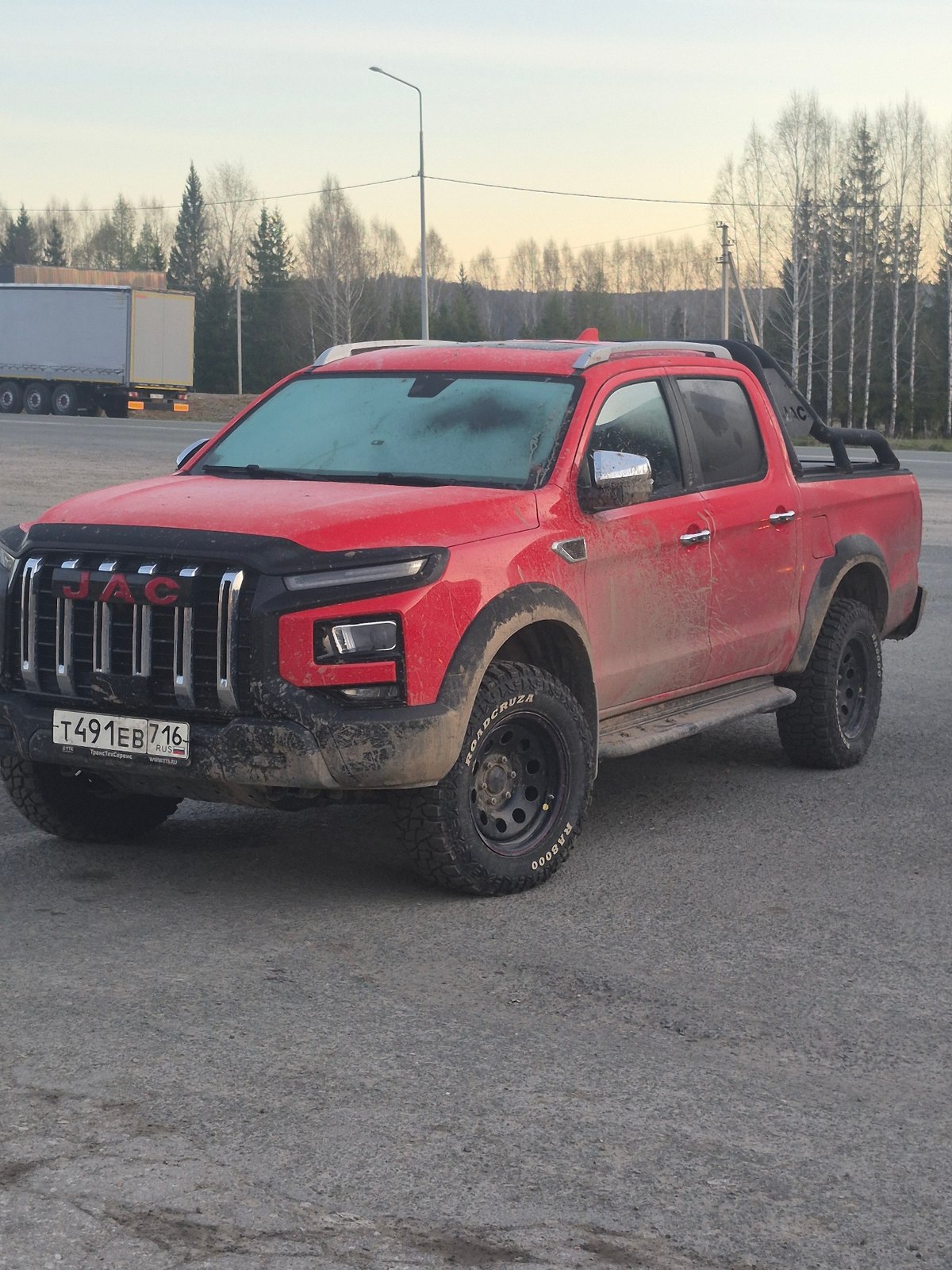 Muddy pickup truck spotted near Café Inzer, Russia