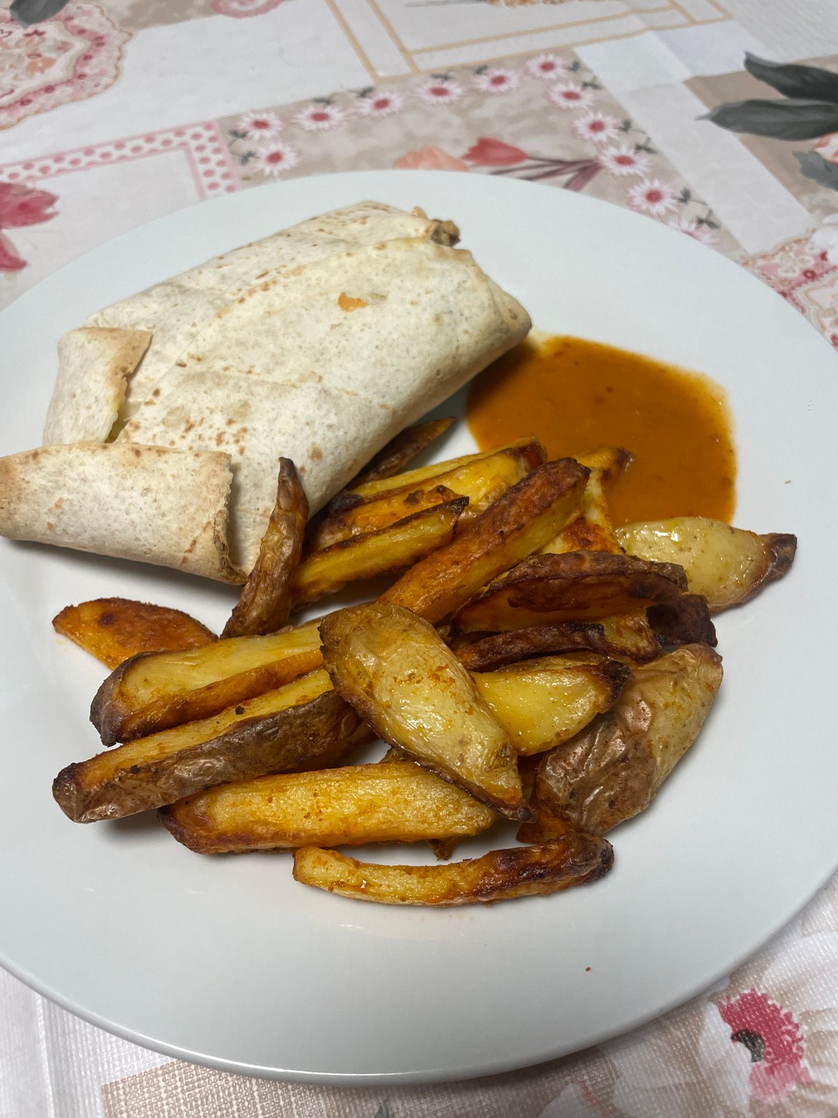Tortilla wrap and fries meal documented in Raanana