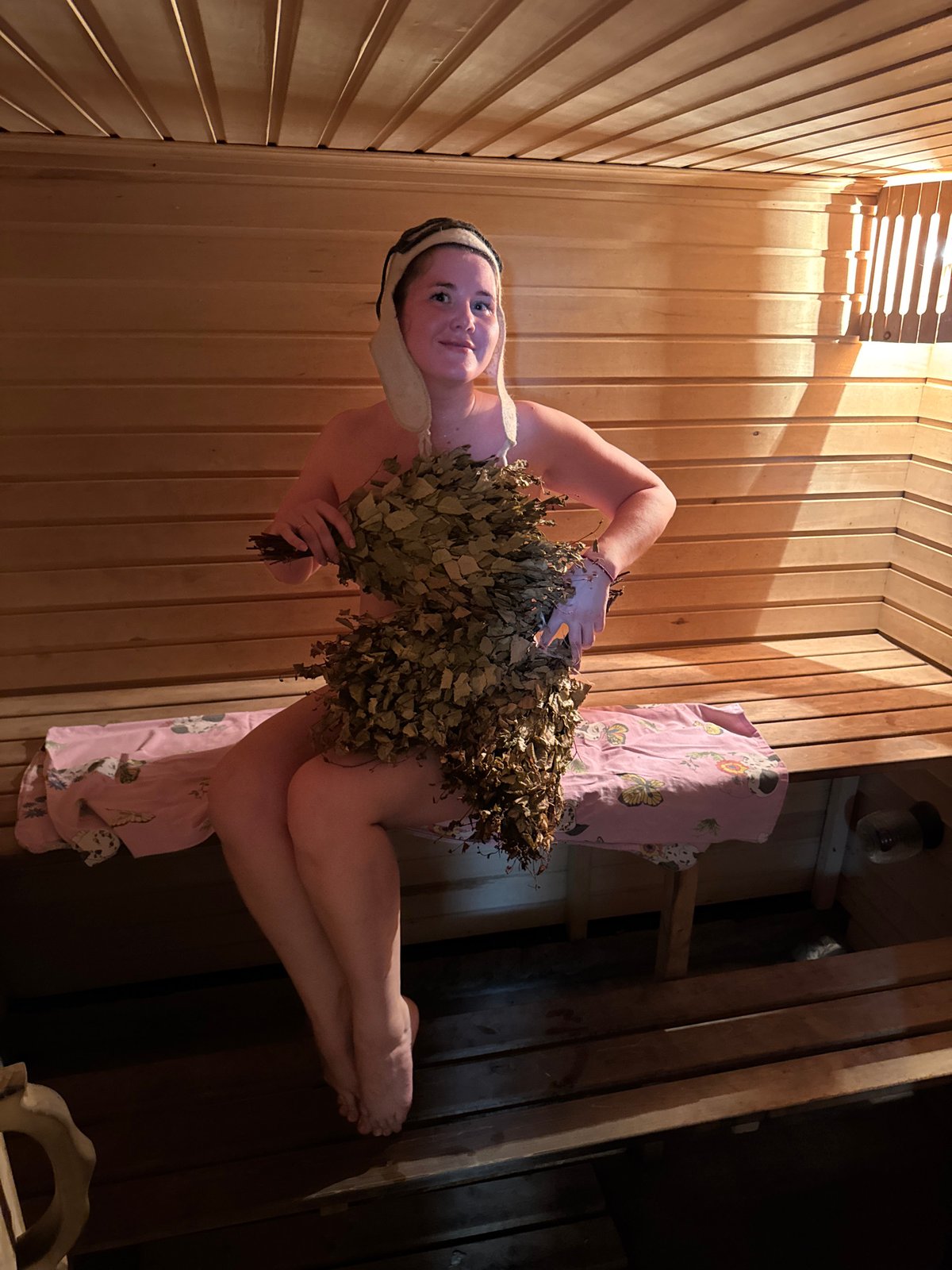 Woman enjoys traditional Russian sauna session in Foki