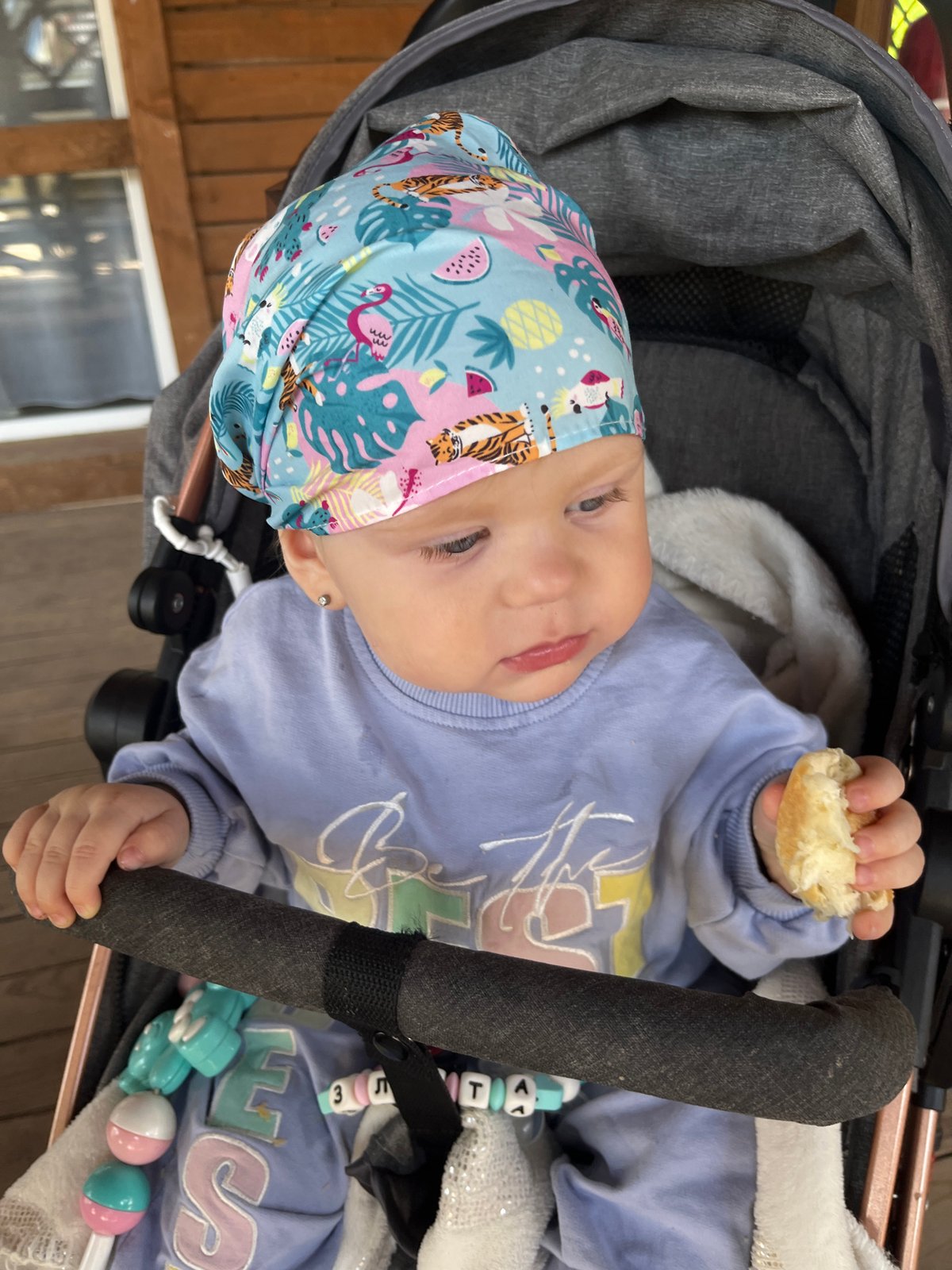 Baby in stroller observed during morning outing in Russia