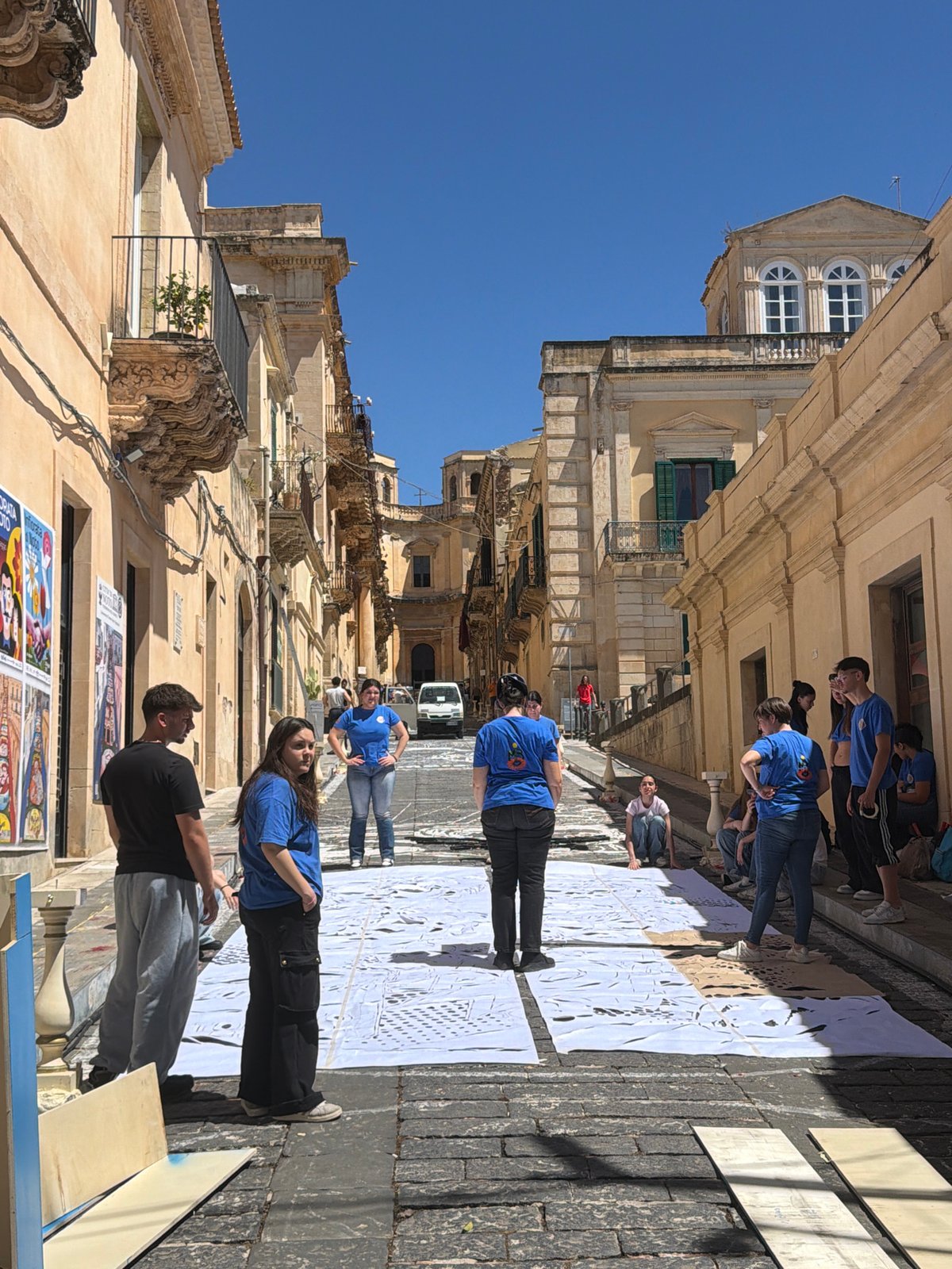 Street art project unfolds on cobblestones in Noto, Italy
