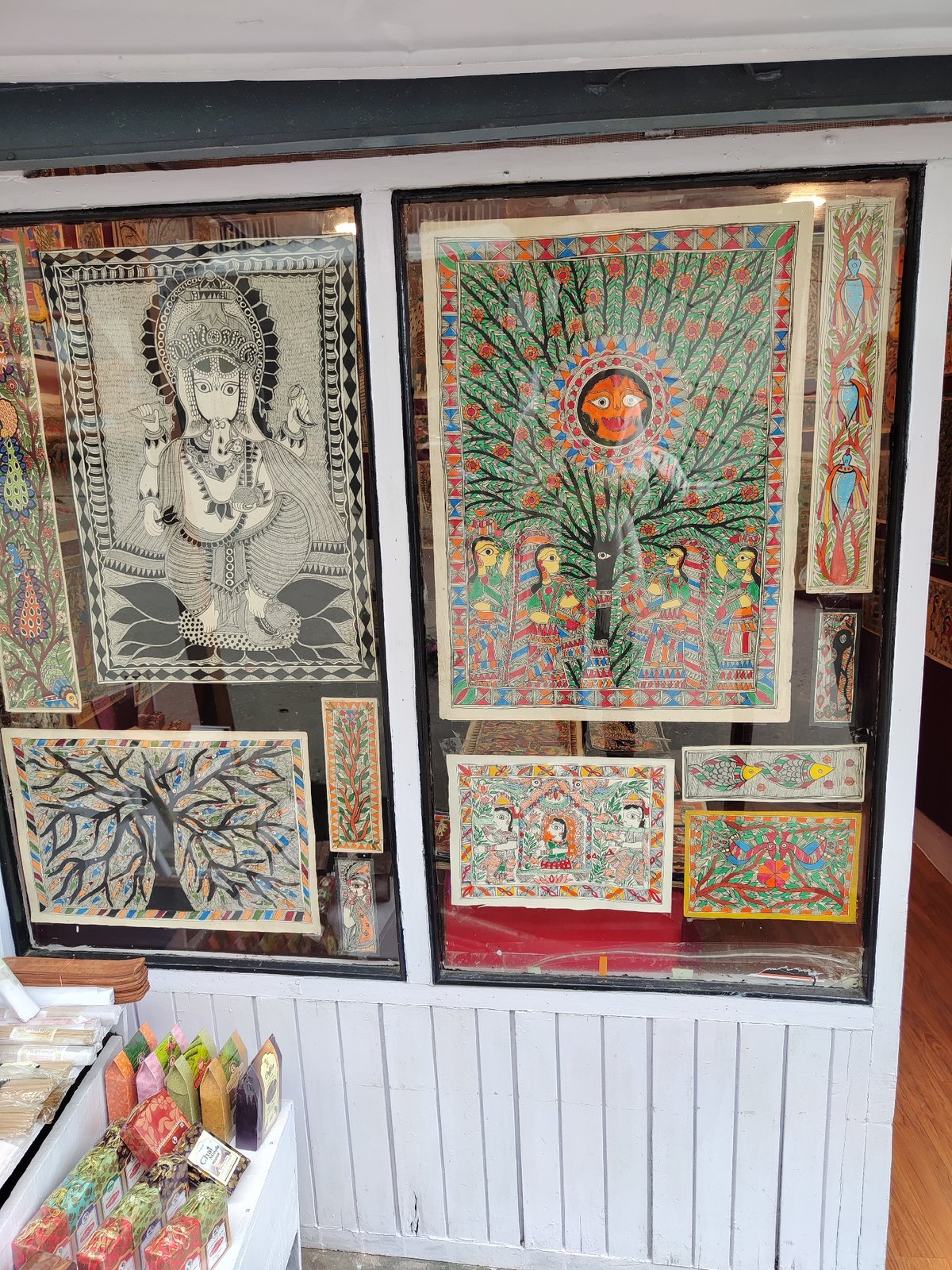 Cultural district scenes captured: folk art storefront, stone pathway