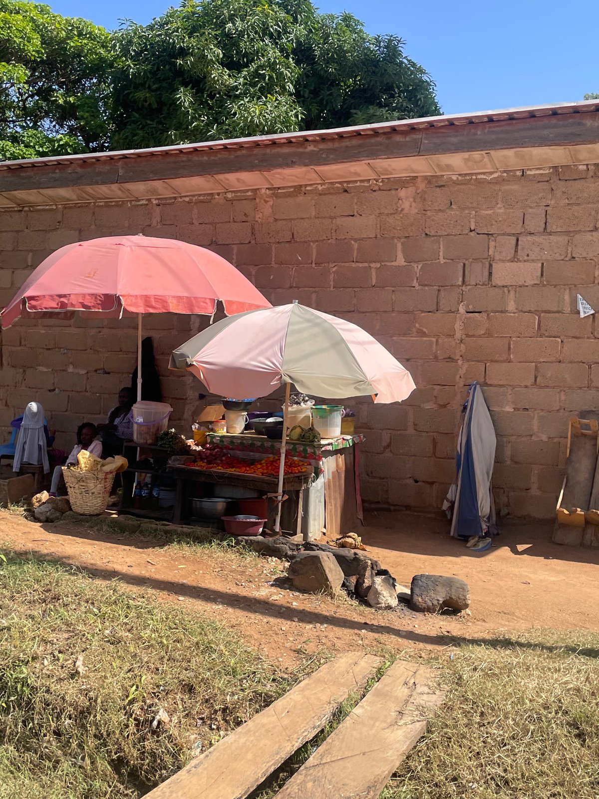 Street-level commerce and activity at a Gura Top roadside market