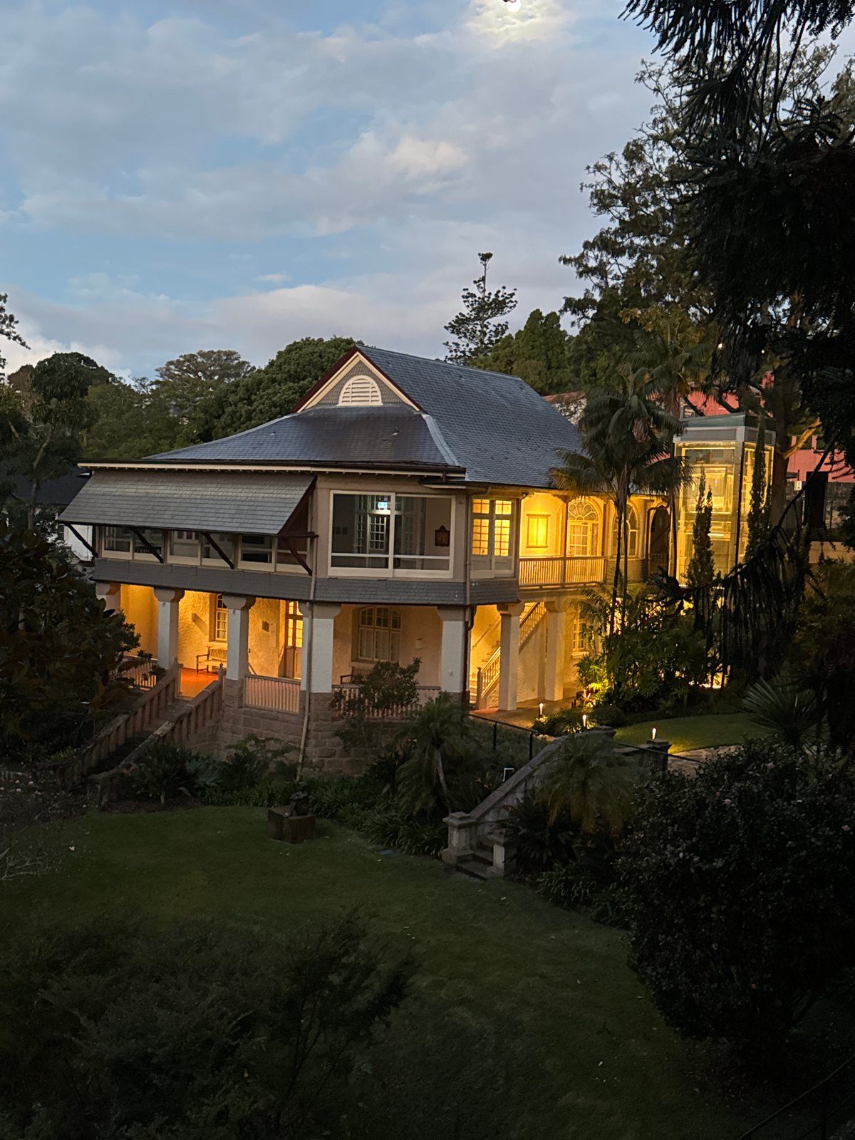 Stately Woolloomooloo home lit up at dusk
