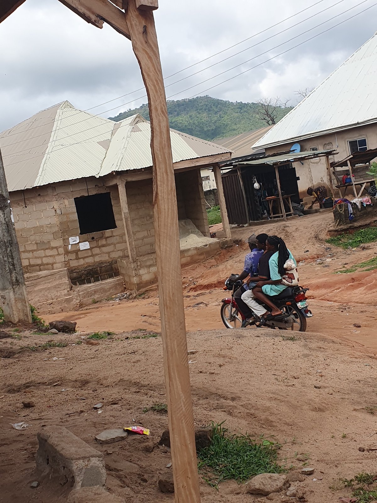 Outdoor pool game documented in Lokoja, Nigeria streets