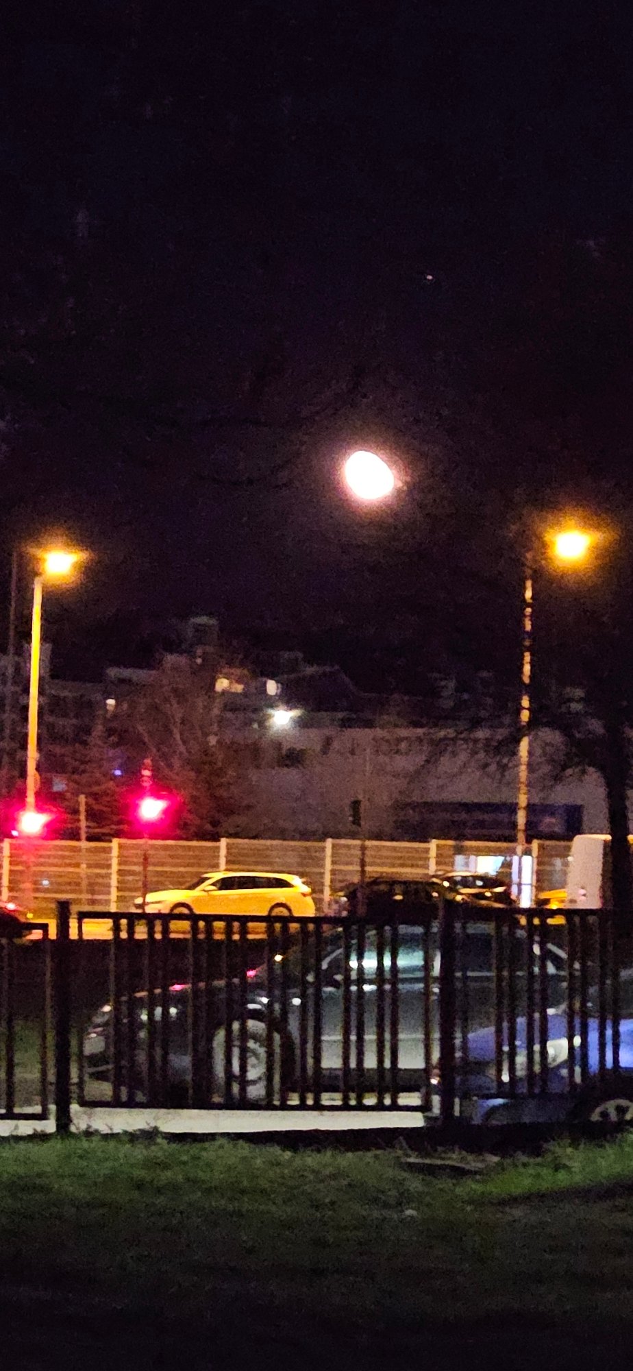 Bright moon illuminates Sofia street scene on April evening