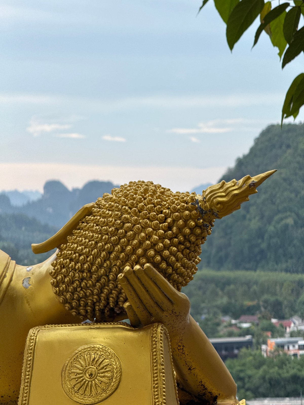 Exploring Tiger Cave Temple's statues and karst views near Krabi