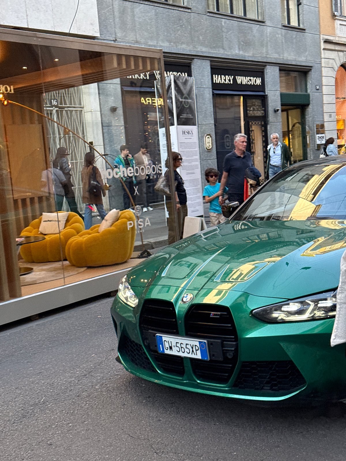 Luxury cars gather on Milan's Via Montenapoleone amid protests