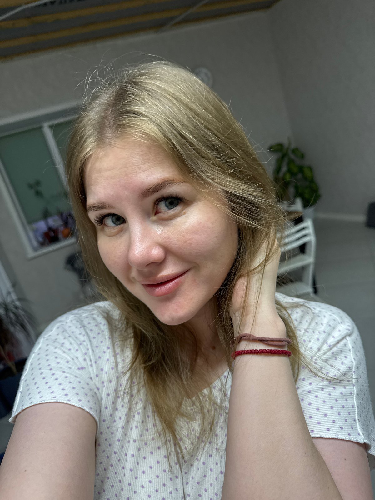 Woman photographed indoors in Gornyi, Russia early morning