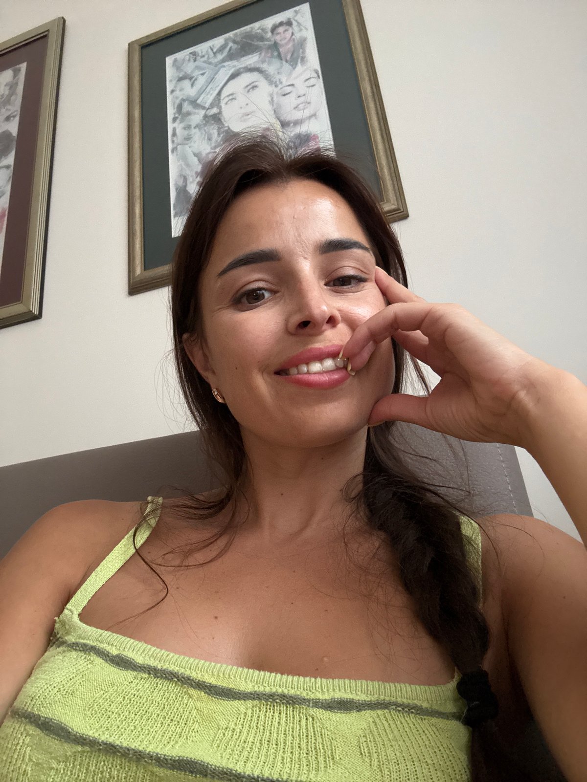 Indoor selfie session in a green striped top