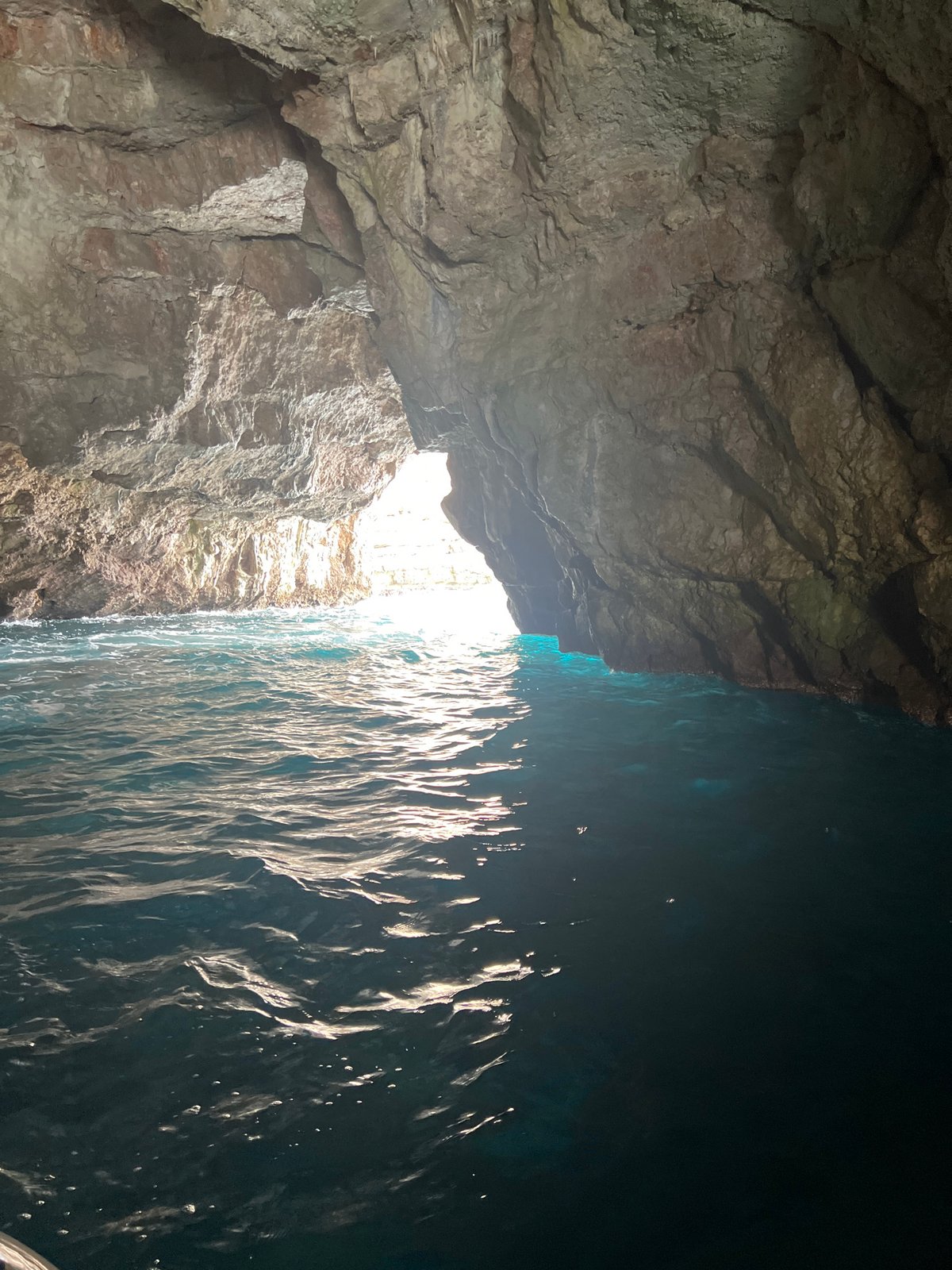 Tour boat visits Blue Cave in Luštica, Montenegro
