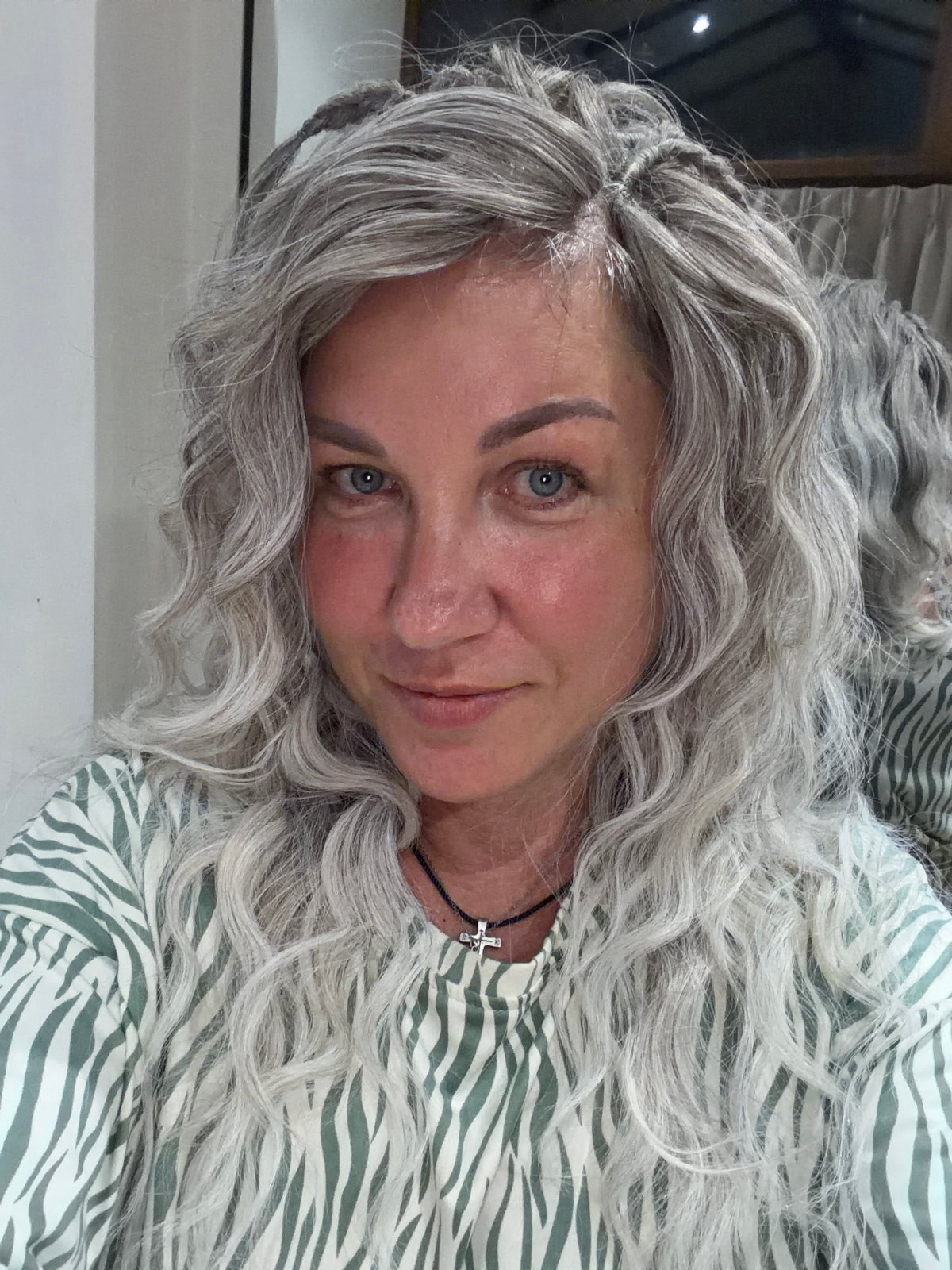 Portrait photograph of gray-haired woman captured by witness
