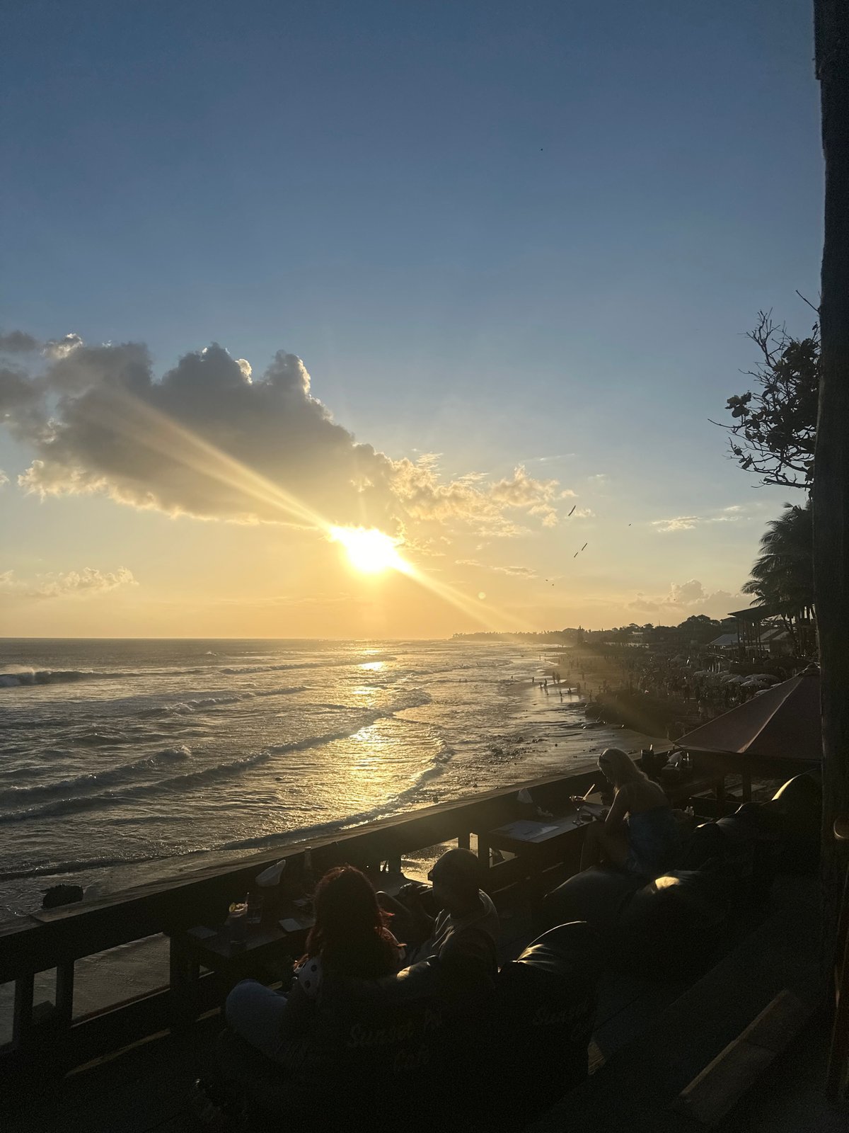 Sunset crowds, ocean views, dogs, and ice cream at the beach