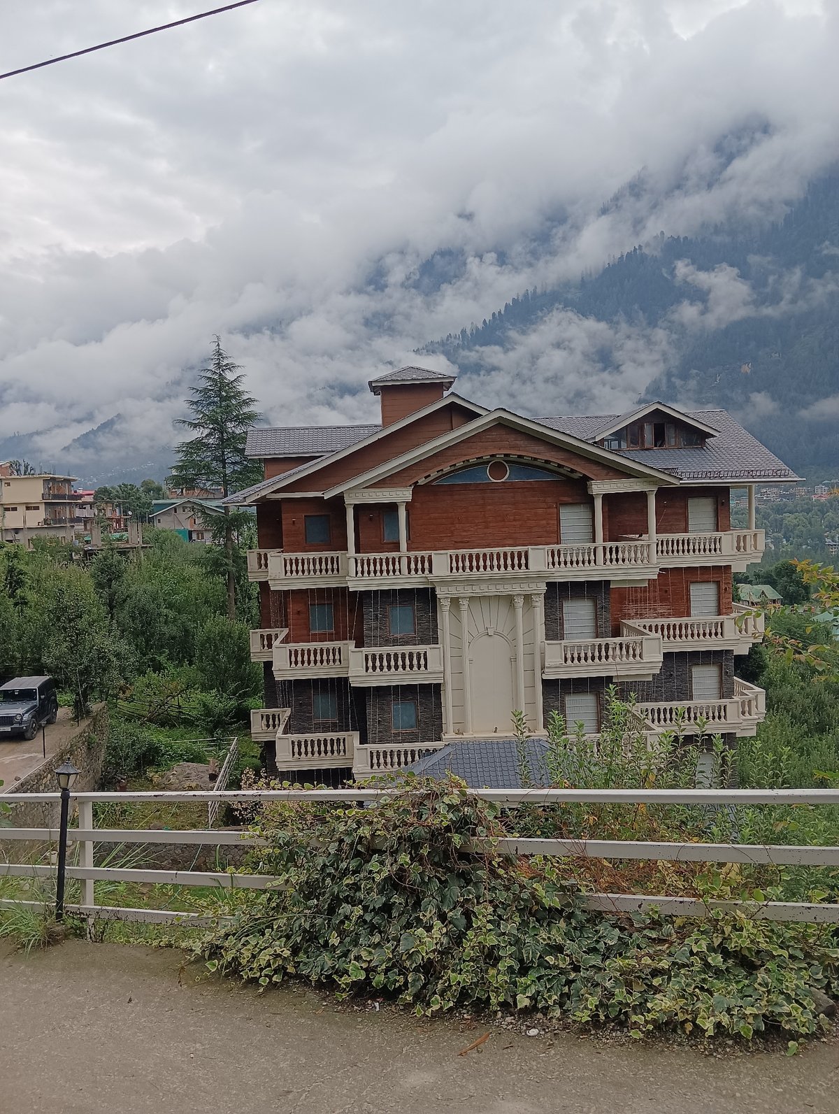 Wooden architecture and mountain roads in Chhyal, India