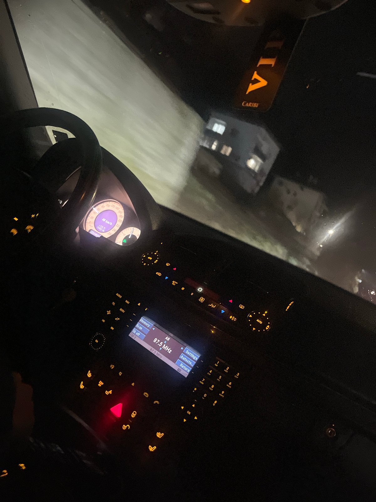 Night driving through Srednogortsi, Bulgaria captured from car interior