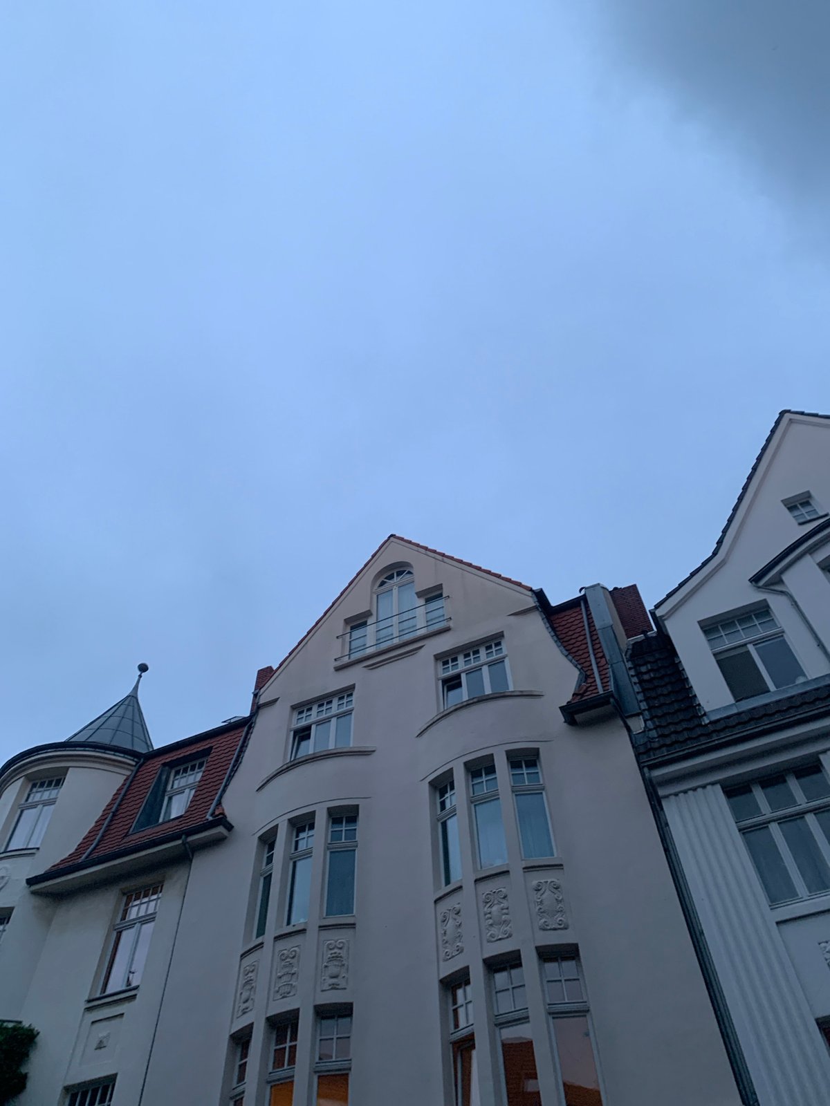 Urban architecture and streetscape documented during overcast evening