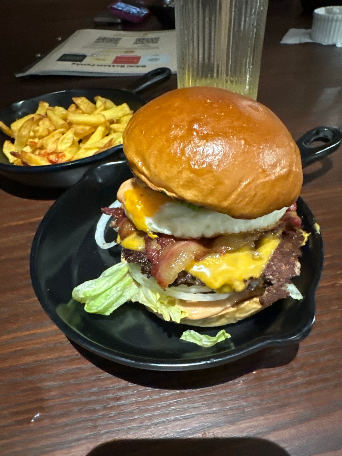 Loaded hamburger and fries served in Đà Nẵng